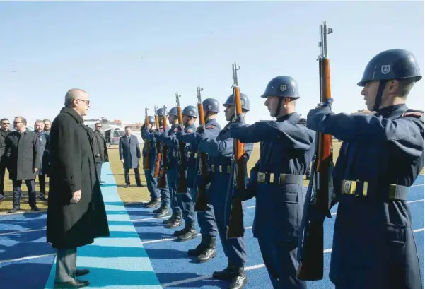 ?? — Reuters ?? Turkish President Tayyip Erdogan reviews a guard of honour as he arrives a meeting in Kutahya on Saturday.