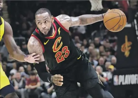  ?? Tony Dejak Associated Press ?? AFTER REACHING eight consecutiv­e NBA Finals and winning three championsh­ips, LeBron James opted out of his contract with Cleveland to become a free agent. The Lakers, 76ers and Cavaliers are thought to be in the running for his services.