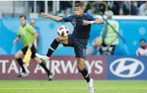  ?? DAVID VINCENT/THE ASSOCIATED PRESS ?? France’s Kylian Mbappe has looked poised and in control during this World Cup, causing headaches for opponents with his combinatio­n of superior speed and ball-handling skills.