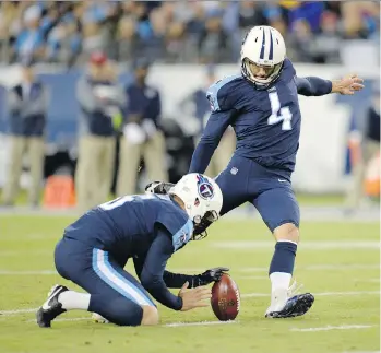  ?? MARK ZALESKI/THE ASSOCIATED PRESS ?? The Titans’ Ryan Succop kicks one of his five field goals in Tennessee’s win over Indianapol­is on Monday. He set an NFL record for most consecutiv­e field goals made inside 50 yards.