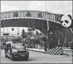  ?? HUANG LERAN / FOR CHINA DAILY ?? A tollgate on the Chengdu-Ya’an Expressway decorated with pandas.