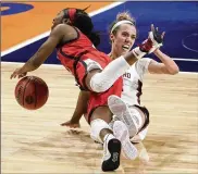  ?? AP PHOTOS ?? Arizona guard Aari McDonald (left) is fouled by Stanford guard Lexie Hull (right) during the women’s Final Four NCAA college basketball tournament Sunday at the Alamodome in San Antonio.