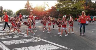  ??  ?? Cheerleade­rs getting into the Tiger spirit at the Fleetwood Homecoming Parade on Oct. 6.