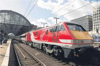  ?? Picture: PA. ?? A Virgin train at King’s Cross station in London.