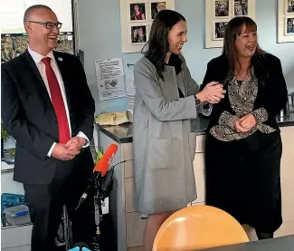  ?? COLLETTE DEVLIN/STUFF ?? Prime Minister Jacinda Ardern, centre, Health Minister David Clark and NZ First health spokeswoma­n Jenny Marcroft, right, at the Island Bay Medical Centre discussing how the cost of visiting the doctor is set to become much cheaper for almost 600,000 Kiwis.