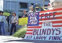  ?? DON RYAN, AP ?? Protesters gather outside the federal courthouse in Portland, Ore. The trial began this week for protest leader Ammon Bundy and six others in the wildlife refugee standoff.