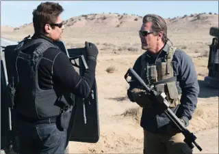  ??  ?? Benicio del Toro as Alejandro Gillick and Josh Brolin as Matt Graver in Sicario 2: Soldado