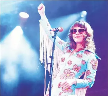  ?? Rune Hellestad Corbis ?? JENNY LEWIS, seen performing in August in Sweden, moved from L.A. to Manhattan after her 2014 album.