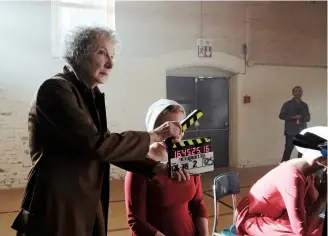  ??  ?? Atwood reads scripts and provides advice for the televised version of The Handmaid’s Tale