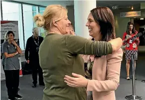  ?? LAINE MOGER/STUFF ?? Prime Minister Jacinda Ardern ran into her midwife, Libby, when she visited the maternity ward at Auckland City Hospital.