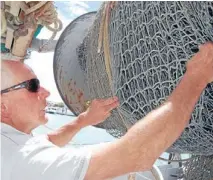  ?? Photo: Neill Gordon/fairfax Media ?? NET PROFIT: Napier’s Rick Burch with his revolution­ary new net design which can help save fishermen money as well as maintain New Zealand’s fisheries.