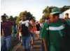  ?? - Reuters ?? JOURNEY: Central American migrants walk along the highway near the border with Guatemala, as they continue their journey trying to reach the US, in Tapachula, Mexico October 22, 2018.