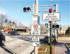  ??  ?? Evergreen Park officials are frustrated over stopped trains and blocked crossings alongCSXro­utes that run through the village.