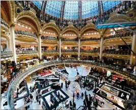  ?? ?? When you get to Paris, you might spend some of that cheap-fare cash you saved at sprawling department store Galeries Lafayette. Or just window-shop.