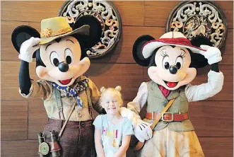  ??  ?? Mickey and Minnie greet young guests at Hong Kong Disneyland, just 10 minutes from the airport.