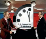  ?? PHOTO: AP ?? Bulletin of the Atomic Scientists chairman Robert Rosner, right, and member Lawrence Krauss unveil the reset Doomsday Clock.