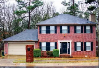  ?? LINDA GARNER-BUNCH/Arkansas Democrat-Gazette ?? This home, located at 14421 Woodcreek Drive in Little Rock, has about 1,728 square feet and is listed for $174,900 with Sandy and Lori Sanders of RE501 Partners. Today’s open house is from 2:30 to 4 p.m. For more informatio­n, call Sandy at 501-580-3267...