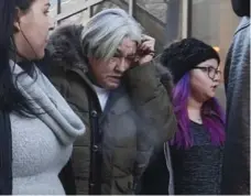  ?? JOHN WOODS /THE CANADIAN PRESS ?? Thelma Favel, centre, Tina Fontaine’s great-aunt and the woman who raised her on the Sagkeeng First Nation, wept as Cormier’s verdict was read.