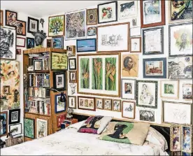  ?? SABBATINI/THE NEW YORK TIMES WHITTEN ?? Patric McCoy’s bedroom in Chicago on July 3. McCoy, an enthusiast­ic art buyer, has some 1,300 paintings, sculptures and drawings stuffed into his apartment.