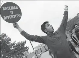  ?? NIKKI WESLEY, METROLAND ?? Student Krish Gandhi hollers at passing cars during the support rally for Robert Bateman high school held in early May.