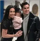  ??  ?? ON THE WAY: Coutinho with wife Aine and daughter Maria at Luton airport