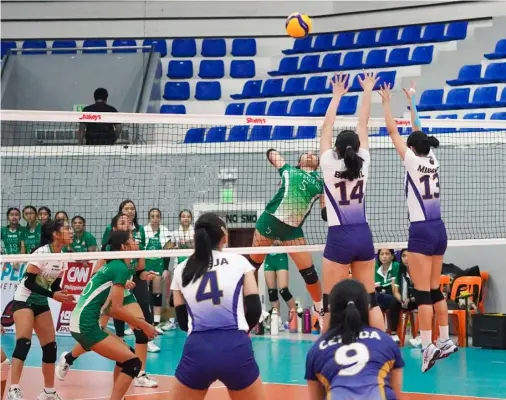  ?? ?? The Lady Green Archers from Lipa bowed to NY Lady Bulldogs but bounce back with a win over recovered University of Perpetual Help System Dalta. The two teams made it to the quarterfin­als.