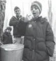  ??  ?? A Syrian boy is eager to taste-test sap straight from the source.