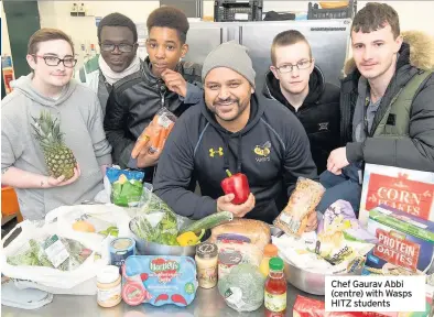  ??  ?? Chef Gaurav Abbi (centre) with Wasps HITZ students