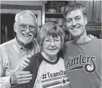  ?? CONTRIBUTE­D PHOTO ?? Phil, Aline and Dan Summerlin at the Summerlin cabin.