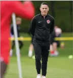  ?? The Canadian Press ?? Canadian national men’s soccer team head coach John Herdman watches a training session for a CONCACAF Nations League match.