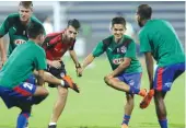  ?? — Agencies ?? Bengaluru FC players warm up ahead of their match against Chennayin FC.