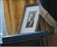  ?? AP PHOTO/PABLO MARTINEZ MONSIVAIS, FILE ?? In this Feb. 9, 2017, file photo, a portrait of President Donald Trump’s father Fred Trump, and three un-signed Executive orders are seen in the Oval Office of the White House in Washington. The New York Times is reporting that President Donald Trump received at least $413 million from his father over the decades, much of that through dubious tax dodges, including outright fraud.