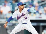  ?? Jim McIsaac / Getty Images ?? The Mets’ Marcus Stroman pitches against the Marlins on Tuesday at Citi Field in New York.