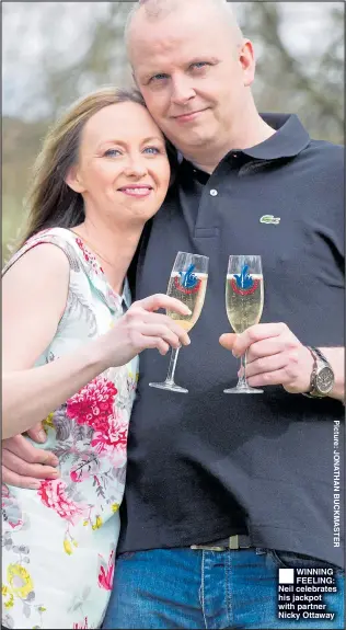  ??  ?? ®Ê WINNING FEELING: Neil celebrates his jackpot with partner Nicky Ottaway