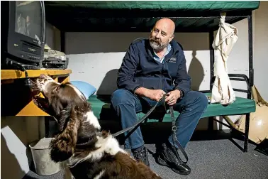  ?? CHRISTEL YARDLEY/STUFF ?? Steve Shadbolt and Ciggie are one of five dog teams trained to sniff out synthetic drugs in prison.