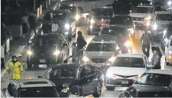  ?? NAM Y. HUH/THE ASSOCIATED PRESS ?? Heavy traffic is seen Thursday at O’Hare Internatio­nal Airport in Chicago as the holiday travel season swings into full gear. While always hectic, travel this year might go relatively smoothly if the weather cooperates.