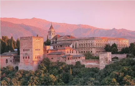  ?? DOMINIC ARIZONA BONUCCELLI ?? At the edge of Granada’s Moorish quarter is a fine viewpoint for watching the sun set over the Alhambra.