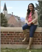  ?? ERIC LUTZENS — THE DENVER POST ?? Nga Vuong-sandoval stands for a portrait on the University of Denver campus on Wednesday.