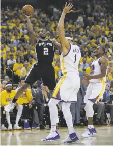  ?? Carlos Avila Gonzalez / The Chronicle ?? Kawhi Leonard shoots over JaVale McGee in Game 1 of the West finals. The Spurs’ forward likely won’t play in Game 4.