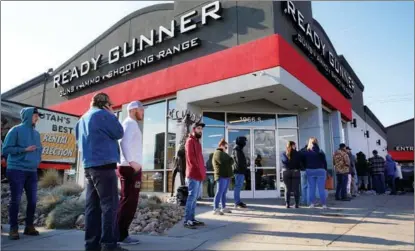  ?? GEORGE FREY / AFP ?? People line up to buy guns and ammunition at a store in Orem, Utah, in the United States, on Jan 10. Such sales have risen in the state since the Capitol Building was stormed in Washington on Jan 6.