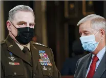  ?? THE WASHINGTON POST VIA AP ?? Joint Chiefs Chairman Gen. Mark Milley, left, and Sen. Lindsey Graham, R-S.C., talk as they arrive the chamber ahead of President Joe Biden speaking to a joint session of Congress, Wednesday, April 28, 2021, in the House Chamber at the U.S. Capitol in Washington.