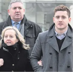  ??  ?? Family support: one of the accused, Paddy Jackson (right) with his parents