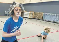  ?? PREMIER PERFORMANC­E ?? Sisters Hannah Loving, left, 13, and Hailey Loving, 8, who are both from Burns Harbor, portray Grizabella and Jemima, respective­ly, in Premier Performanc­e’s production of the musical “Cats: Young Actors Edition” from May 6 to 7 at Duneland Community Church in Chesterton.