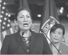  ?? AP FILE ?? Rep. Deb Haaland, D-N.M., left, Native American Caucus co-chair, joined by Rep. Judy Chu, D-calif., chair of the Congressio­nal Asian Pacific American Caucus, speaks to reporters.