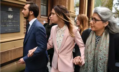  ?? ?? Hannah Quinn, wearing pink, arrives with family and friends at the NSW supreme court, which sentenced her to a two-year community correction­s order. Photograph: Dean Lewins/AAP