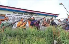  ?? PTI ?? Village Defence Guards take positions guard in Udhampur district on Sunday.