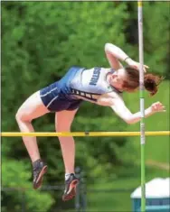  ?? PETE BANNAN — DIGITAL FIRST MEDIA ?? West Chester Rustin’s Courtney Rock clears the pole vault bar Wednesday.