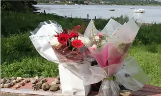  ??  ?? The late John Wadding-Byrne and flowers at Kaats Strand in his memory.