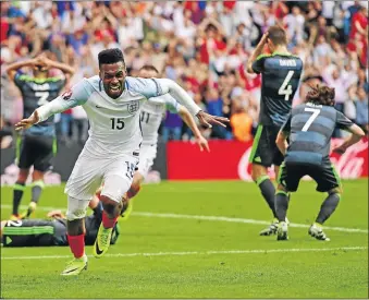  ?? PHOTO: DAN MULLAN/GETTY IMAGES ?? DEATH KNELL: Substitute Daniel Sturridge celebrates scoring England’s second goal at Stade Bollaert-Delelis yesterday in Lens, France