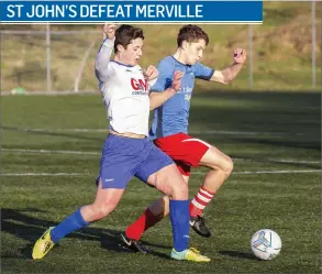  ??  ?? Stephen Keenan of Merville in action with St John’s Conor King. Pic: Donal Hackett.